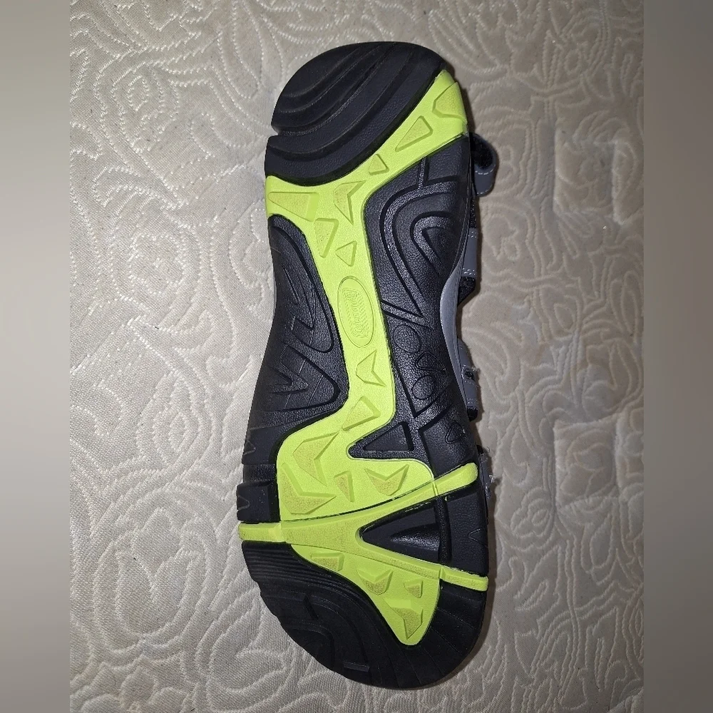 A pair of Coleman George sandals in a men's size 13M. They're in excellent shape